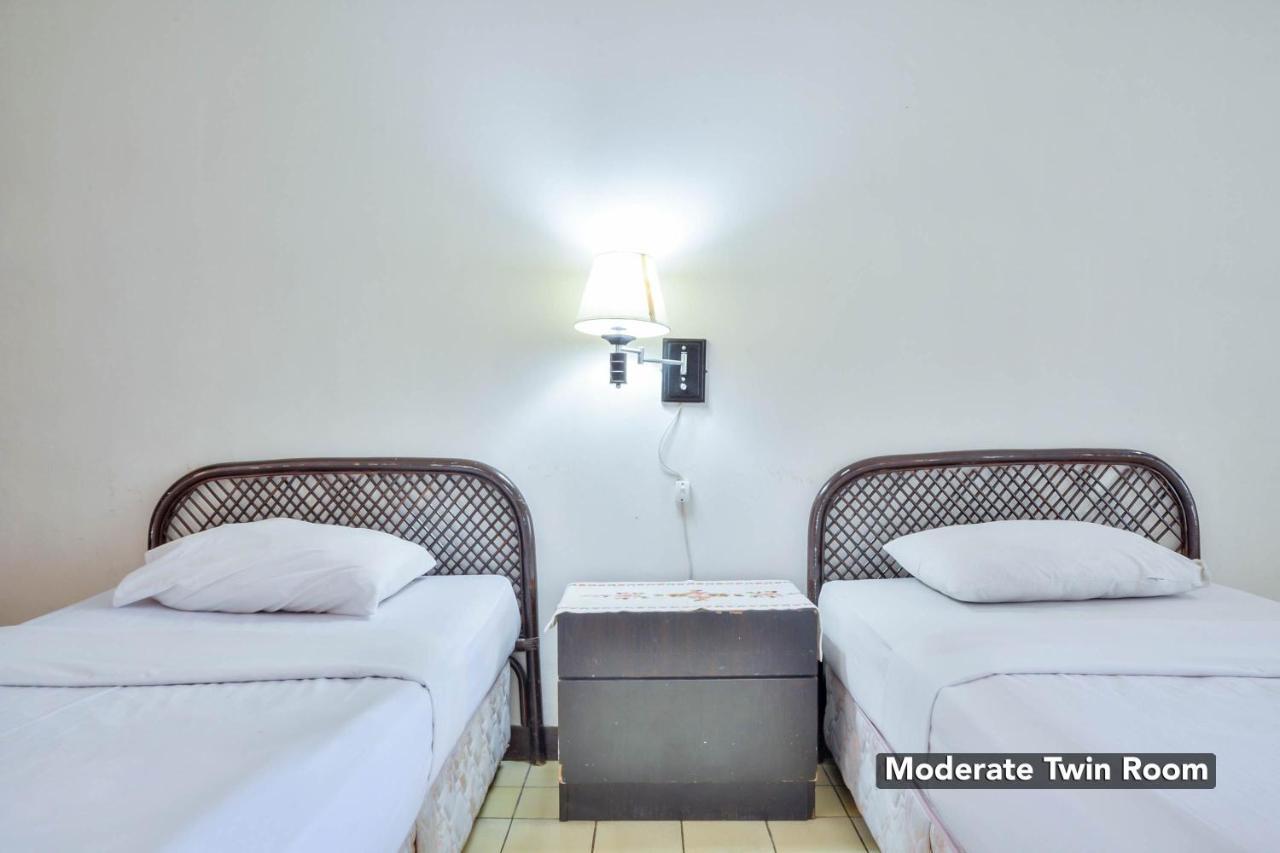 Silintong Hotel Ambarita Esterno foto